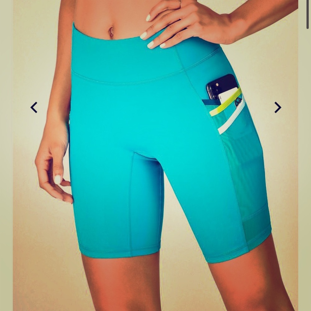 Blue biker shorts with side pockets